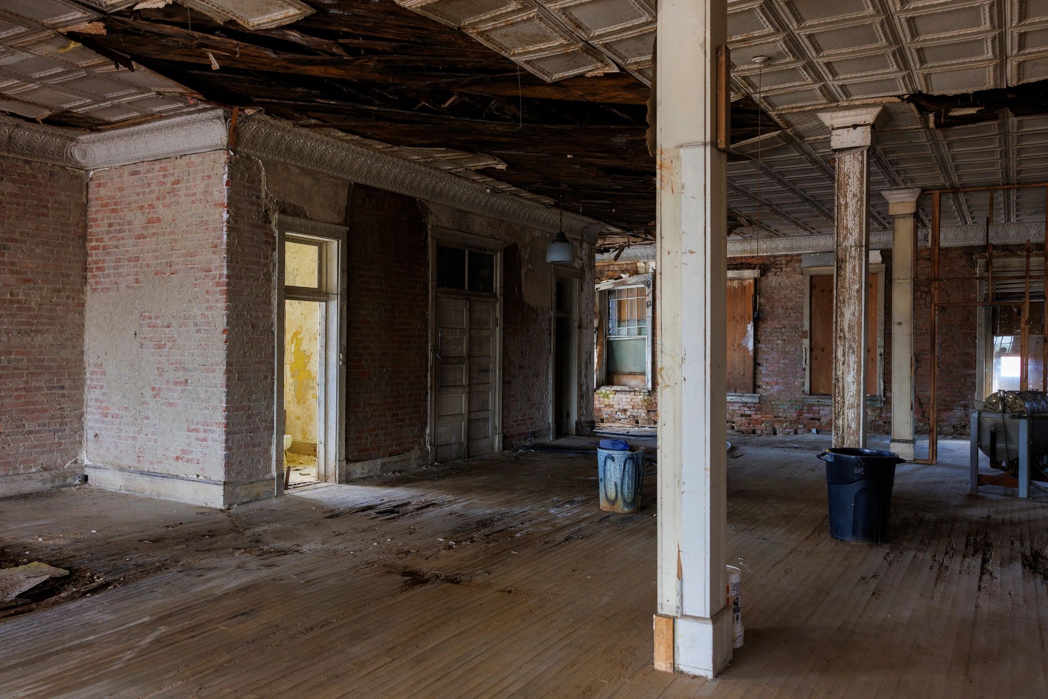 Interior commercial property undergoing structural assessment